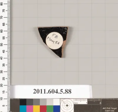 Terracotta fragment of a kylix (drinking cup)