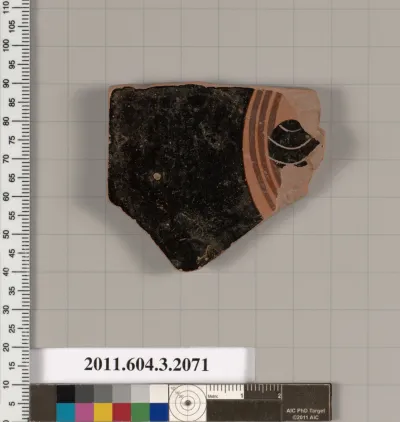 Terracotta fragment of a kylix (drinking cup)