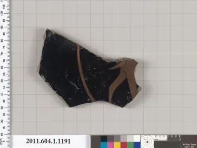 Terracotta fragment of a kylix (drinking cup)