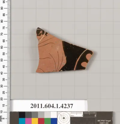 Terracotta fragment of a kylix (drinking cup)