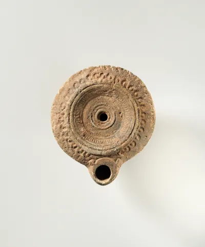 Terracotta oil lamp