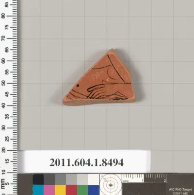 Terracotta fragment of a stemless kylix (drinking cup)