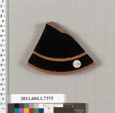 Terracotta fragment of a kylix (drinking cup)