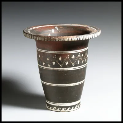 Terracotta kalathos (vase in the shape of a wool basket)