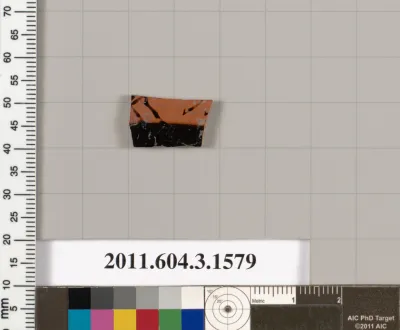 Terracotta fragment of a kylix: Band cup (drinking cup)