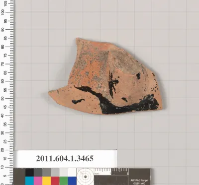 Terracotta fragment of a kylix (drinking cup)