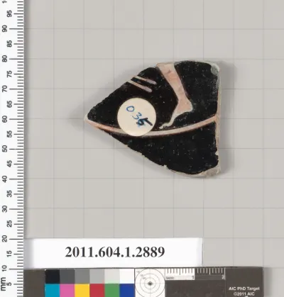 Terracotta fragment of a kylix (drinking cup)