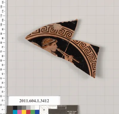 Terracotta fragment of a kylix (drinking cup)