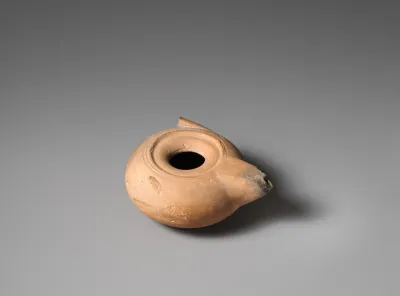 Terracotta oil lamp