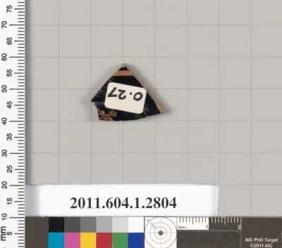 Terracotta fragment of a kylix (drinking cup)