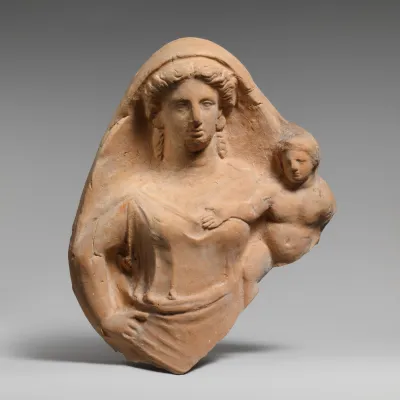Fragment of a terracotta relief of a woman and child