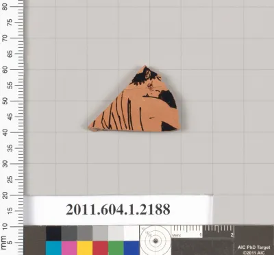 Terracotta fragment of a kylix (drinking cup)