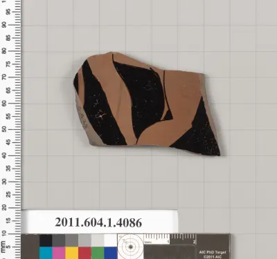 Terracotta fragment of a kylix (drinking cup)