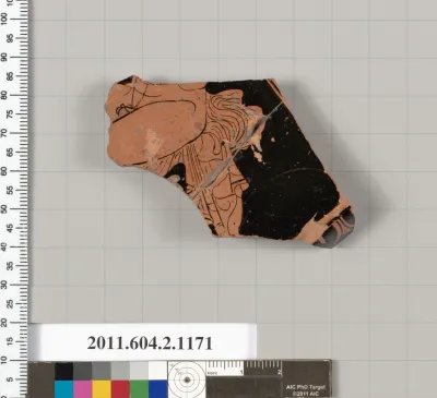 Terracotta fragment of a lekanis lid (covered dish)