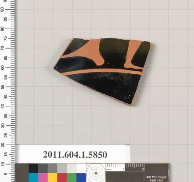 Terracotta fragment of a kylix: eye-cup  (drinking cup)