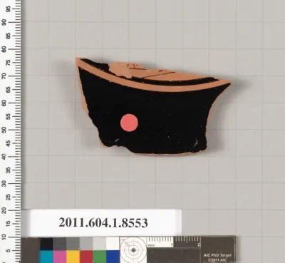 Terracotta fragment of a stemless kylix (drinking cup)