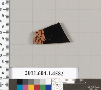 Terracotta fragment of a kylix (drinking cup)