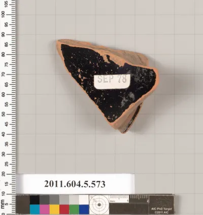 Terracotta fragment of a stemless kylix (drinking cup)