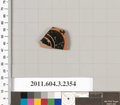 Terracotta fragment of a kylix: eye-cup (drinking cup)