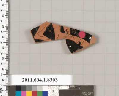 Terracotta fragment of a kylix (drinking cup)