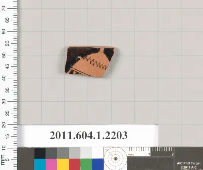 Terracotta rim fragment of a kylix (drinking cup)