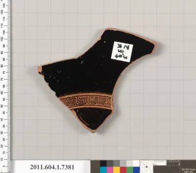 Terracotta fragment of a kylix (drinking cup)