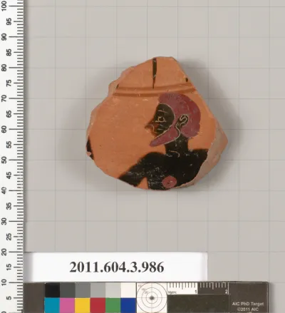 Terracotta fragment of a lekanis lid (covered dish)