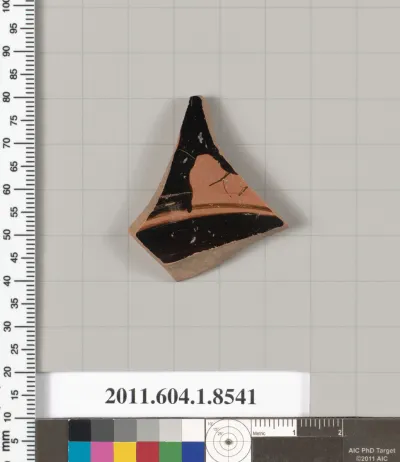 Terracotta fragment of a stemless kylix (drinking cup)