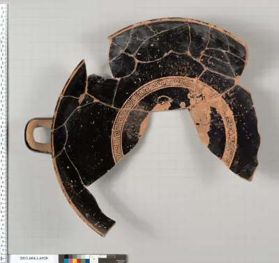 Terracotta fragment of a kylix (drinking cup)