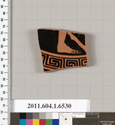 Terracotta fragment of a kylix (drinking cup)