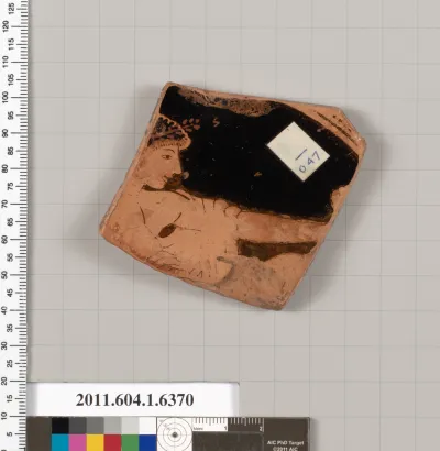 Terracotta fragment of a kylix (drinking cup)