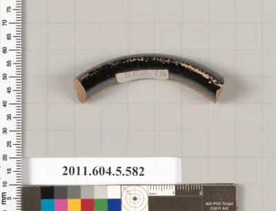 Terracotta fragment of a stemless kylix (drinking cup)?