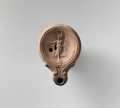Terracotta oil lamp