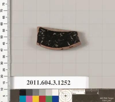 Terracotta fragment of a kyathos (cup-shaped ladle)