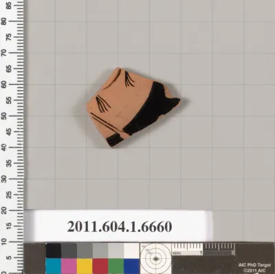 Terracotta fragment of a kylix (drinking cup)