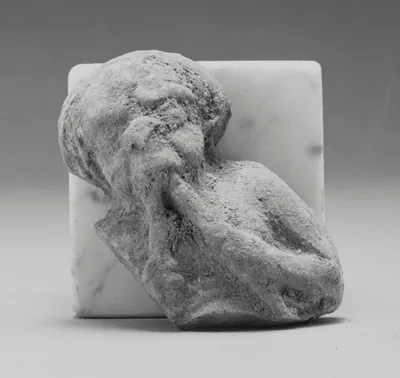 Fragment of a Figure of a Satyr Playing Flutes