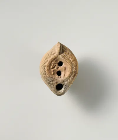 Terracotta oil lamp