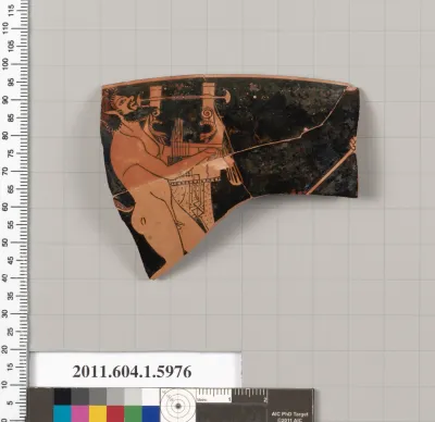 Terracotta rim fragment of a kylix (drinking cup)