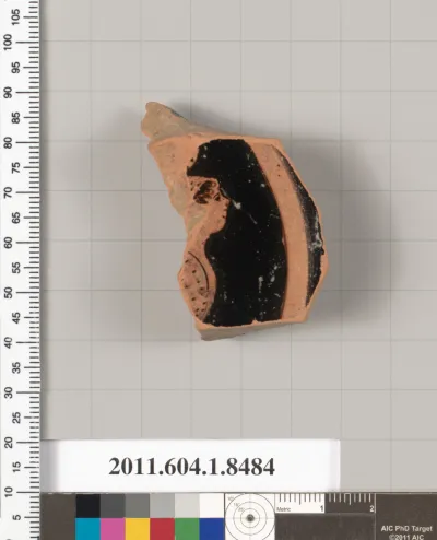 Terracotta fragment of a stemless kylix (drinking cup)