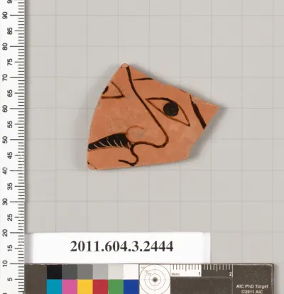 Terracotta fragment of a kylix (drinking cup)