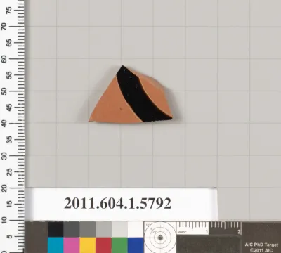 Terracotta fragment of a kylix: eye-cup  (drinking cup)