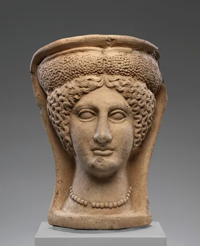 Female Votive Head