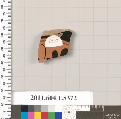 Terracotta fragment of a kylix (drinking cup)