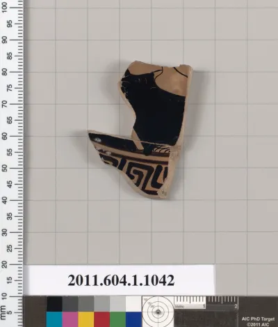 Terracotta fragment of a kylix (drinking cup)