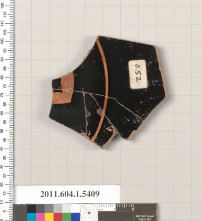 Terracotta fragment of a kylix (drinking cup)