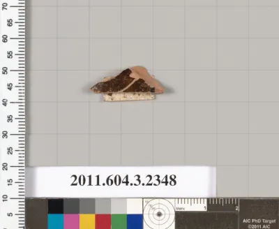 Terracotta fragment of a kylix: eye-cup (drinking cup)