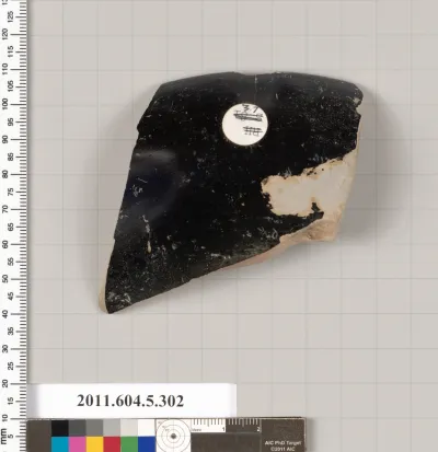 Terracotta rim fragment of a kylix (drinking cup)