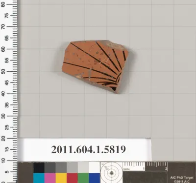 Terracotta fragment of a kylix: eye-cup  (drinking cup)