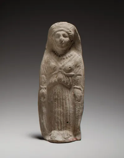 Standing female figurine