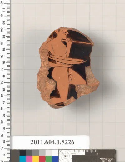 Terracotta fragment of a kylix (drinking cup)